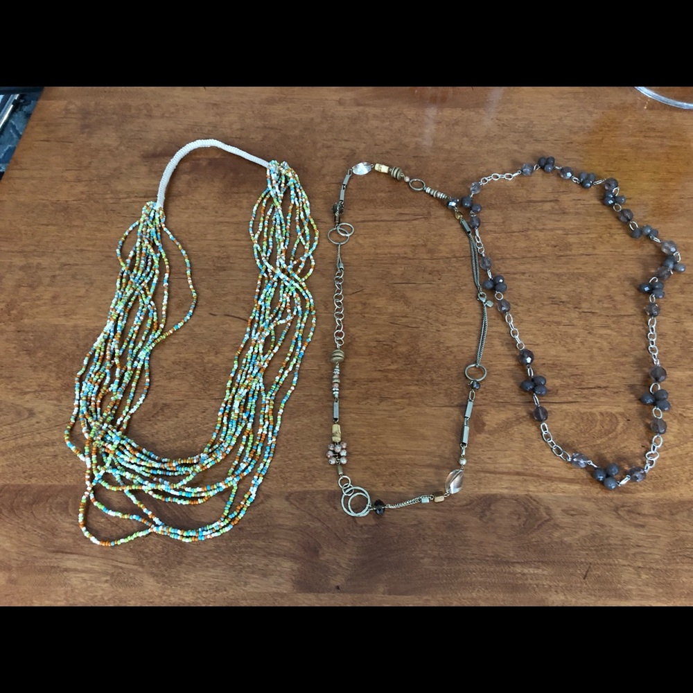 Three costume jewelry necklaces